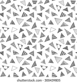 Abstract geometric black and white background with hand drawn triangles. Contemporary modern style. Vector seamless pattern.