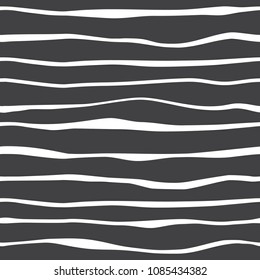 Abstract geometric black and white lines waves seamless pattern. Ocean sea beach texture. Striped minimalistic monochrome background. Vector wavy decorative design for textile print,wallpaper,wrapping