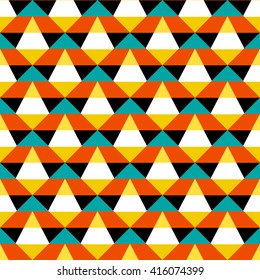 Abstract geometric color blocked pattern with stripes, squares, random geometric shapes. Vector seamless abstract print in op art style. Orange and blue bold textile design for fall winter fashion