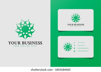Abstract geometric floral logo with mandala style in green gradient concept for your business