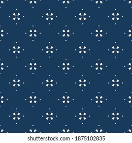 Abstract geometric floral seamless pattern. Simple vector minimalist texture with small flower silhouettes, diamonds. Elegant minimal background in dark blue color. Repeat design for decor, print, web