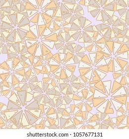 Abstract geometric flowers from triangles are randomly distributed. Seamless pattern.