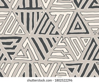 Abstract geometric hand-drawn grayscale freaky triangles seamless pattern. Vector doodle background.