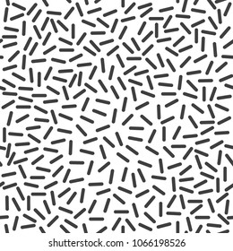 Abstract geometric lines seamless pattern background. Memphis style background with small dashes lines. Vector trendy funky background.