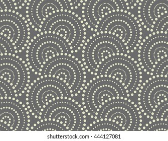 Abstract geometric pattern by the points, circles. Grey ornament. A seamless vector background.