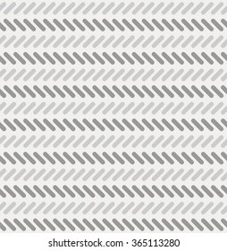 Abstract geometric pattern in grey, chevron pattern