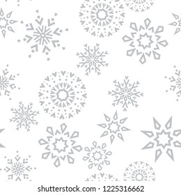 Abstract geometric pattern with lines, snowflakes. A seamless vector background. White and grey texture. Graphic modern pattern
