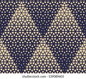 Abstract geometric pattern with rhombuses. A seamless vector background. Gold and blue texture.