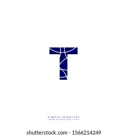 Abstract geometric patterned blue T logo letter simple design concept
