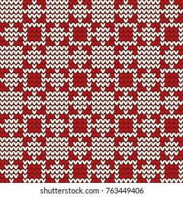 
Abstract geometric red and white knitted pattern of squares. For background, design, decoration, fabrics, paper.
