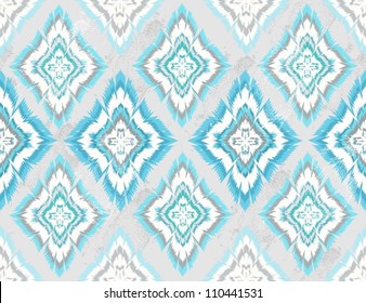 Abstract geometric seamless aztec pattern. Colorful ikat style pattern.