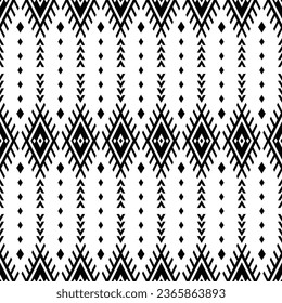 Resumen de un patrón étnico sin fisuras geométricas con motivos tribales orientales. Diseño de motivos nativos para textiles. Blanco y negro.
