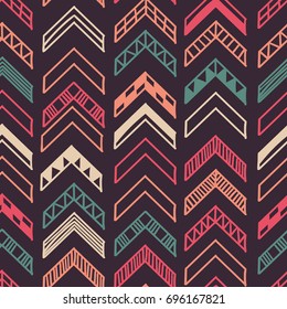 Abstract geometric seamless hand drawn pattern with tribal motifs. Modern texture. Colorful free hand background.