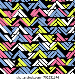 Abstract geometric seamless hand drawn pattern with tribal motifs. Modern texture. Colorful free hand background.