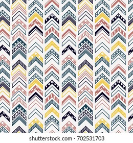 Abstract geometric seamless hand drawn pattern with tribal motifs. Modern texture. Colorful free hand background.