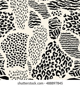 Abstract geometric seamless pattern with animal print. Trendy hand drawn textures.  Modern abstract design for paper, cover, fabric, interior decor and other users