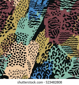 Abstract geometric seamless pattern with animal print. Trendy hand drawn textures. Modern abstract design for paper, cover, fabric, interior decor and other users