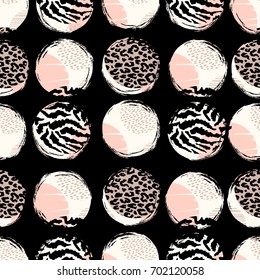 Abstract geometric seamless pattern with animal print and circles. Trendy hand drawn textures. Modern abstract design for paper, cover, fabric, interior decor and other users