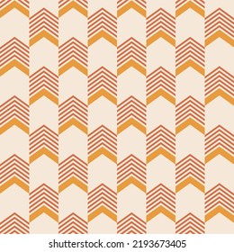 Abstract geometric seamless pattern with arrows. Arrows color vector ethnic pattern. Chevron pattern. Orange, yellow, beige colors. Color vector background.
