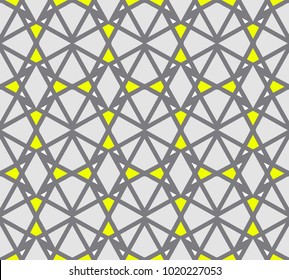 Abstract geometric seamless pattern of black, gray and yellow shapes in vector on isolated background