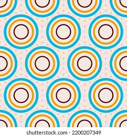 Abstract geometric seamless pattern with color circles. Blue, yellow, brown circles on beige background. Color vector background.