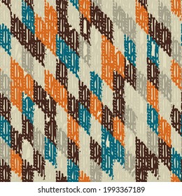 Abstract geometric seamless pattern with colored rectangular segments.
