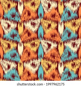 Abstract geometric seamless pattern in doodle style with colored triangular segments.
