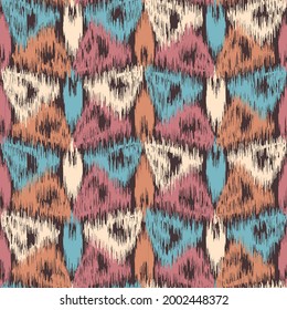 Abstract geometric seamless pattern in doodle style with colored triangular segments.
