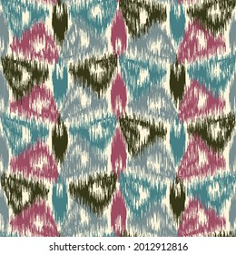 Abstract geometric seamless pattern in doodle style with colored triangular segments.
