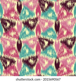Abstract geometric seamless pattern in doodle style with colored triangular segments.
