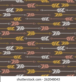 Abstract geometric seamless pattern. Ethnic decorative background with arrows.