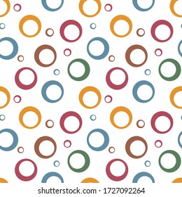 Abstract geometric seamless pattern with hollow circles of different sizes. Simple colorful abstract background. Design for print, fabric, textile, furniture, packaging