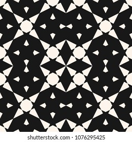 Abstract geometric seamless pattern with star shapes, triangles, rhombuses, repeat tiles. Elegant black and white mosaic texture. Stylish dark monochrome background. Ornamental design for decoration