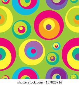 Abstract geometric seamless pattern with varicolored circles. Vector illustration.