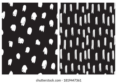 Abstract Geometric Seamless Vector Pattern. White Irregular Brush Spots and Stripes Isolated on a Black Background. Funny Doodle Print. Simple Infantile Style Repeatable Design.