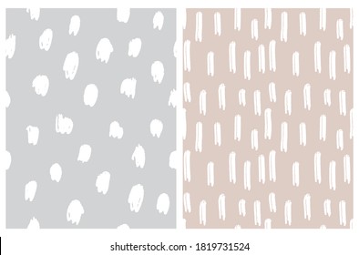 Abstract Geometric Seamless Vector Pattern. White Irregular Brush Spots and Stripes Isolated on a Gray and Beie Background. Funny Doodle Print. Simple Infantile Style Repeatable Design.