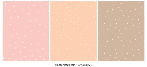 Abstract Geometric Seamless Vector Pattern with White Irregular Brush Spots Isolated on a Light Brown, Pastel Pink and Light Blush Pink Background. Cute Simple Hand Drawn Repeatable Print. 