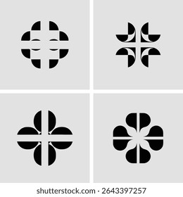 Abstract geometric shapes in black and white arranged in a harmonious square layout