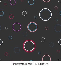Abstract geometric texture of simple colorful circles on a dark background.