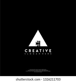 abstract geometric triangle CH logo letters design concept in shadow shape