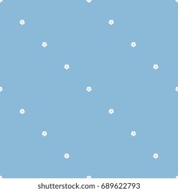 Abstract geometrical seamless pattern. Diagonal rows of small white flowers on blue background.