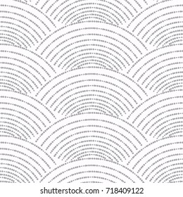 Abstract geometrical seamless pattern of scale shaped elements. Stylized dotted line wallpaper of fan shaped decorations. Arch ornament. Stylized ocean waves. Textile design. Vector illustration
