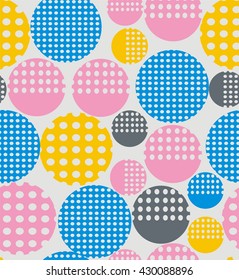 Abstract geometry from circles with holes yellow, pink, blue. A seamless pattern on a light gray background.
