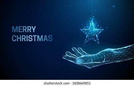 Abstract giving hand with Christmas toy star. Low poly style design. Merry Christmas card. Modern 3d graphic geometric background. Wireframe light connection structure. Isolated vector illustration