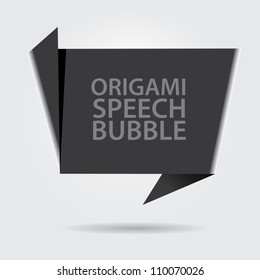 Abstract glossy black origami speech bubble. Vector dark abstract background.