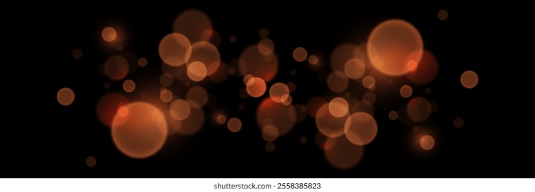 Abstract glowing bokeh lights. Bokeh and magic light effect. On a black background.