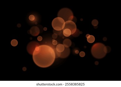 Abstract glowing bokeh lights. Bokeh and magic light effect. On a black background.