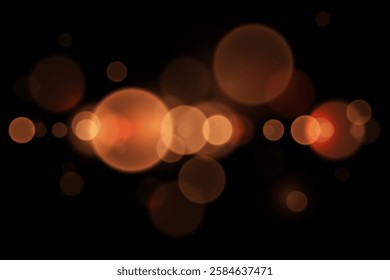 Abstract glowing bokeh lights. Bokeh and magic light effect. On a black background.