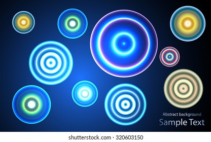 Abstract Glowing Circles of light with Colours Background