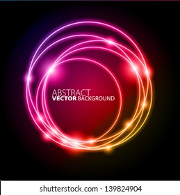 Círculos brillantes abstractos de luz con fondo de colores